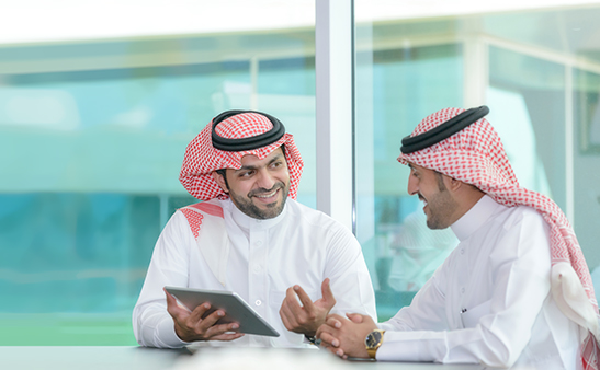 Two people in a meeting